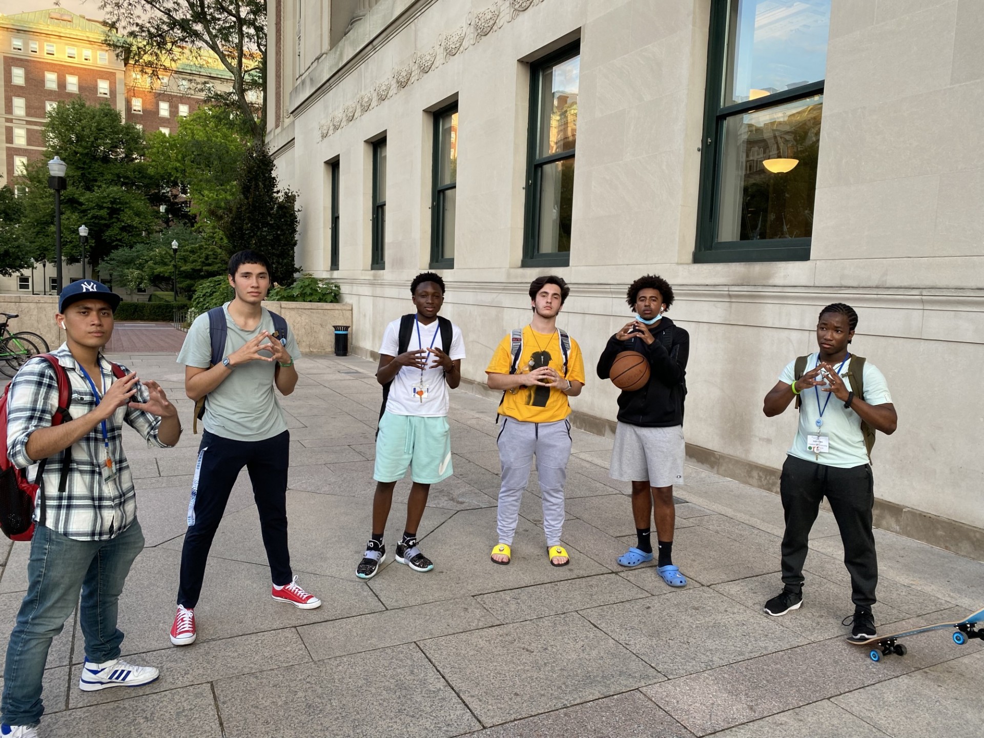 Abel and Students Stand in Semi Circle