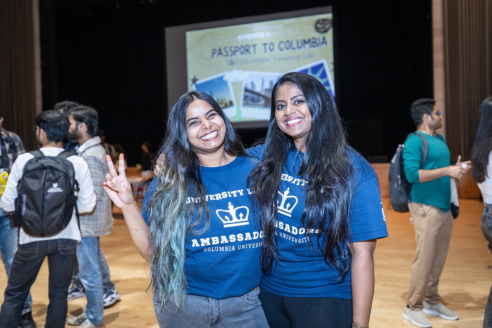 Two Columbia Univeristy Life Students pose next to each other