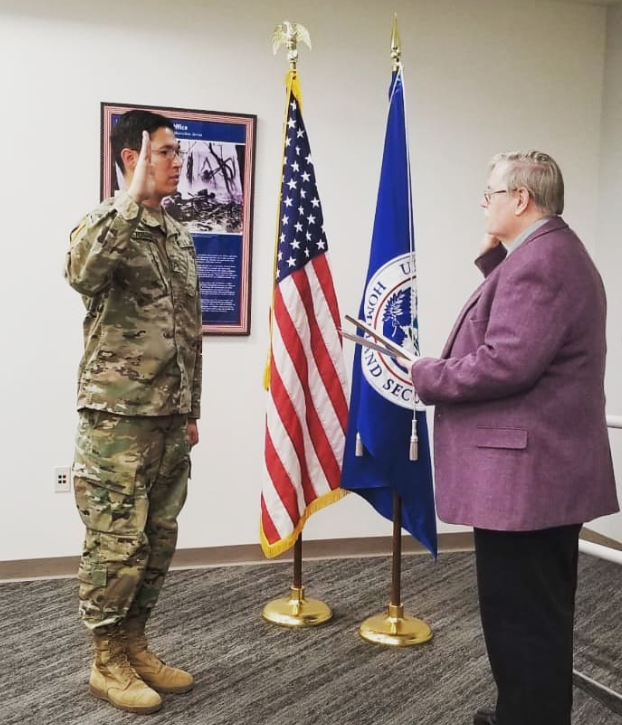 Photo of Julian Taking Oath of Enlistment