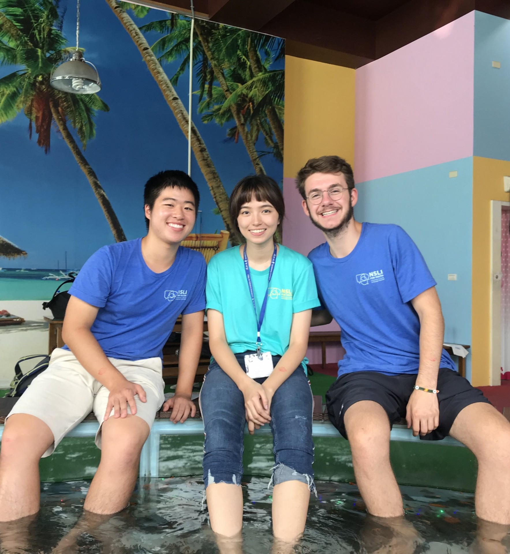 William Yuen Yee at a pool with friends