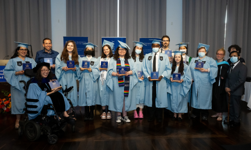 Group of students pose with at Disability Affinity Graduation