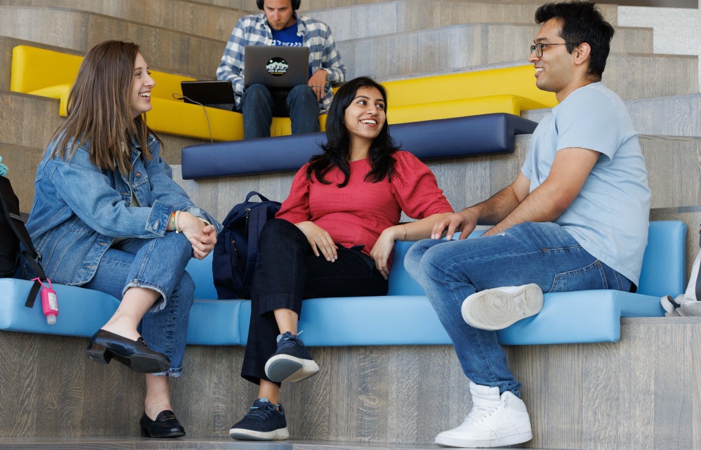 Students sitting on stairs at the Manhattanville campus