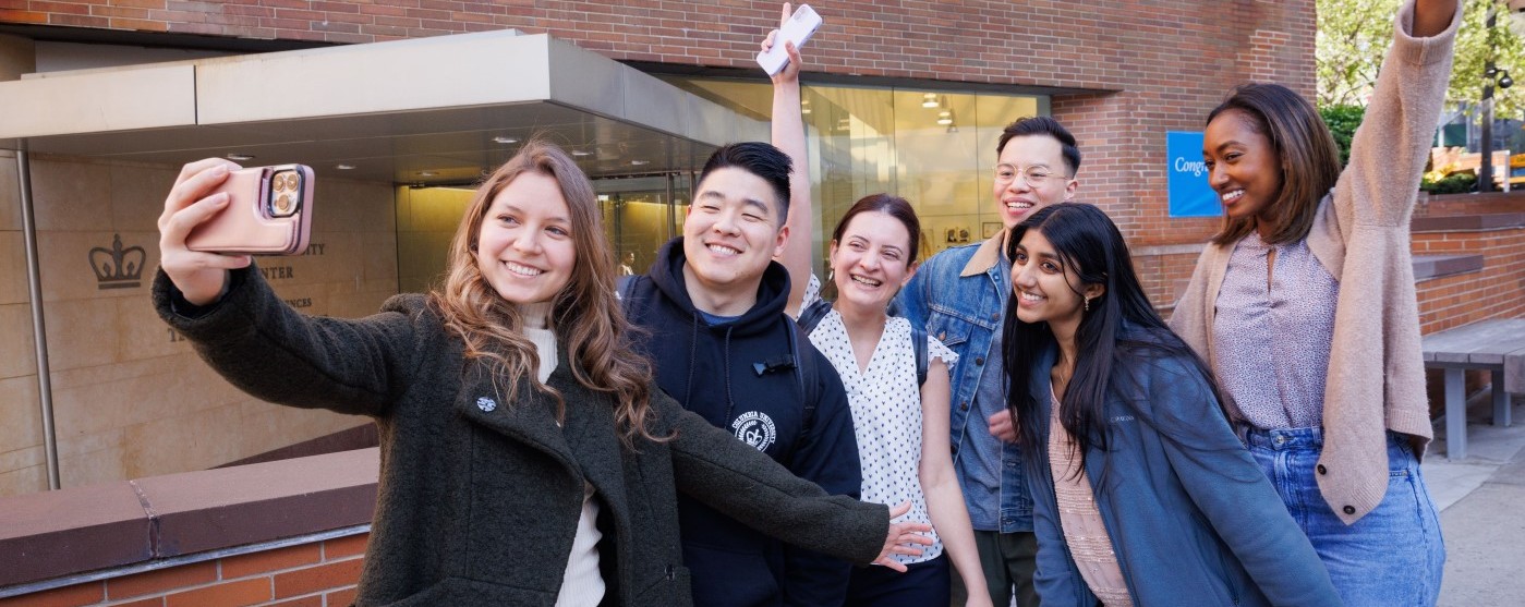 Students posing for a selfie on the CUIMC campus