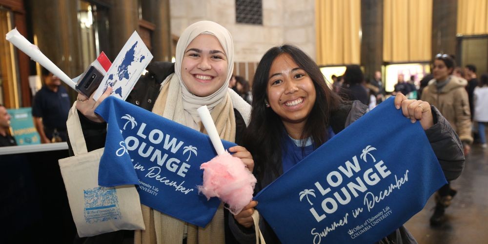 Two students at Low Lounge smiling