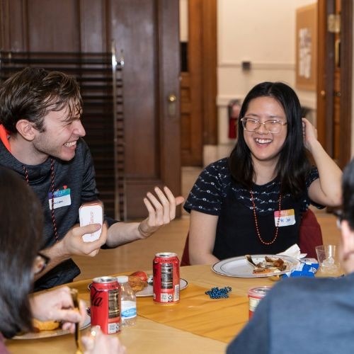 Students chatting at Dinner with Strangers event