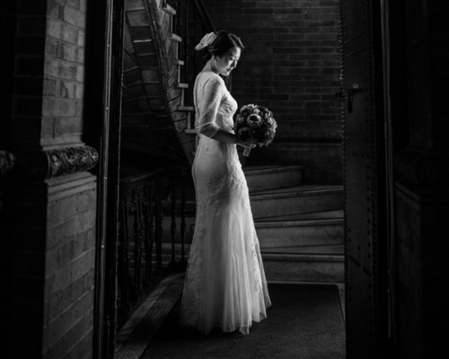 Black and White Photo of Bride with Boquet in St. Paul's Chapel at Columbia University