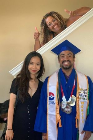Ferdinando with his loved ones the day he graduated from Dallas College Ferdinando in Dallas College regalia