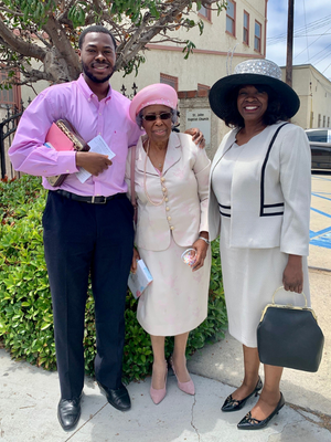 James standing with his grandmother, Kathleen Mosby-Shields, and his mother, Joyce Jennings. Both are lifelong educators in Los Angeles Unified School District and inspirational to James's educational endeavors. James with his mother and grandmother