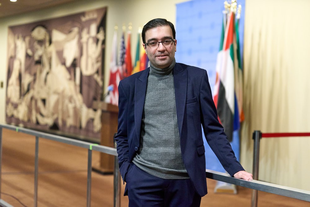 Photo by John Penney. Kourosh at the United Nations headquarters in 2022 when he received a fellowship from the Dag Hammarskjold Fund for Journalists. Kourosh at the United Nations headquarters in 2022 when he received a fellowship from the Dag Hammarskjold Fund for Journalists.