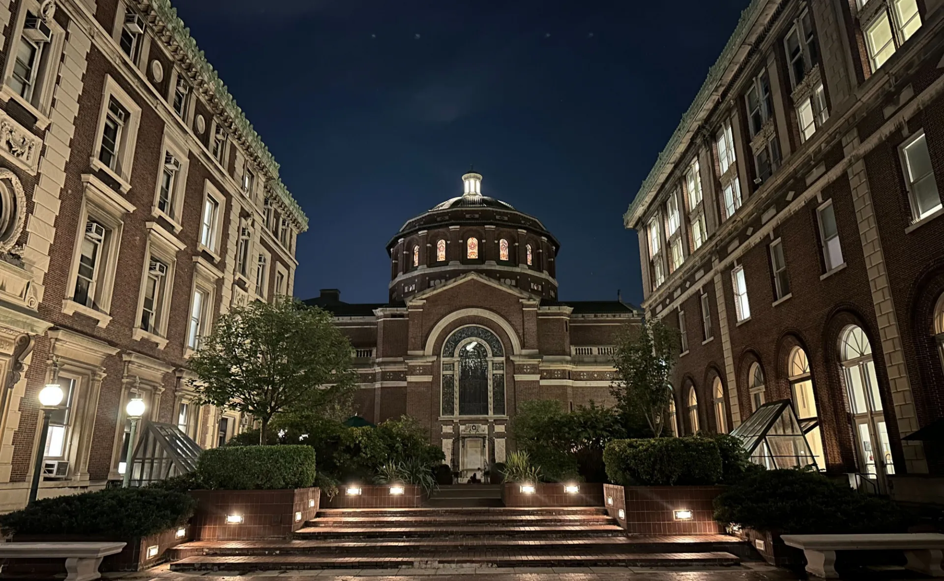 Nighttime image of St. Pauls Chapel, shot from the front.