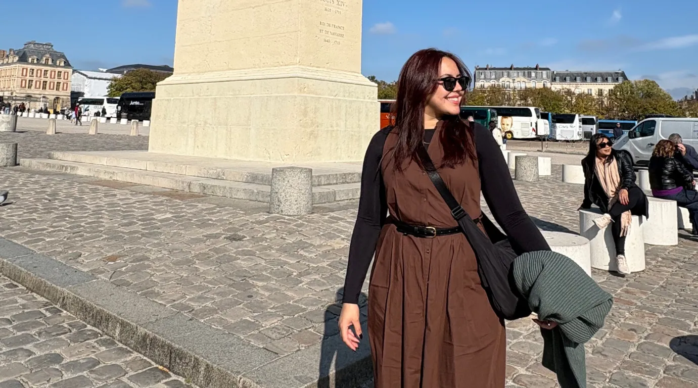 Marina Martins (GS'27) standing in front of a monument in Paris, France. 