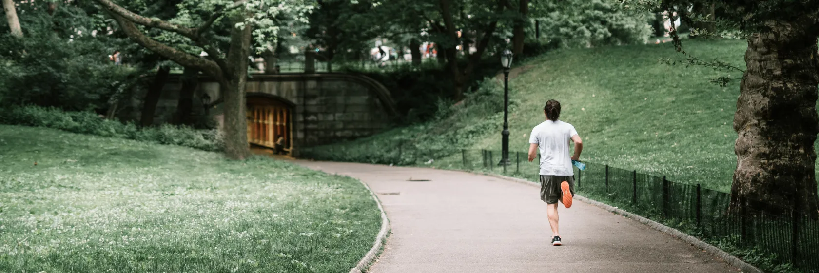 A man runs in the park