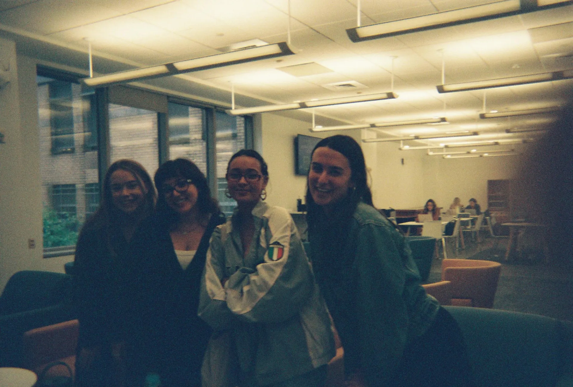 From left to right; Hadley Nyre, Sarah Carllin, Maya Vazquez, and Maya Turnley all posing in front of the camera smiling
