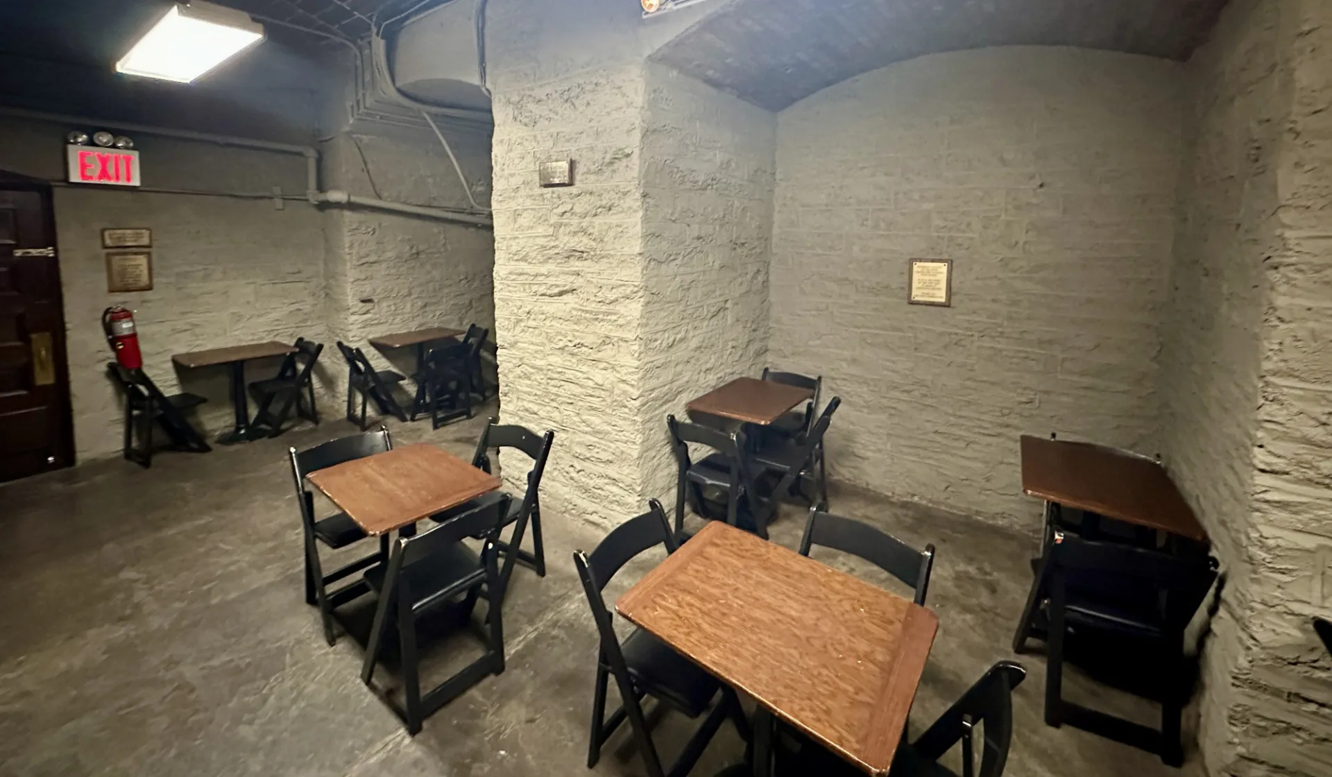 Picture of the Postcrypt space with empty tables and chairs